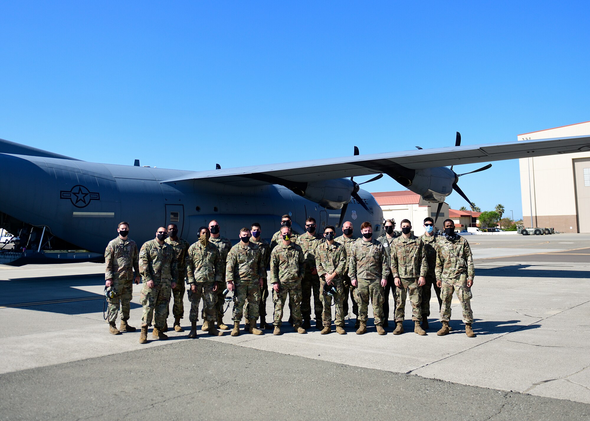 Airmen pose for a photo