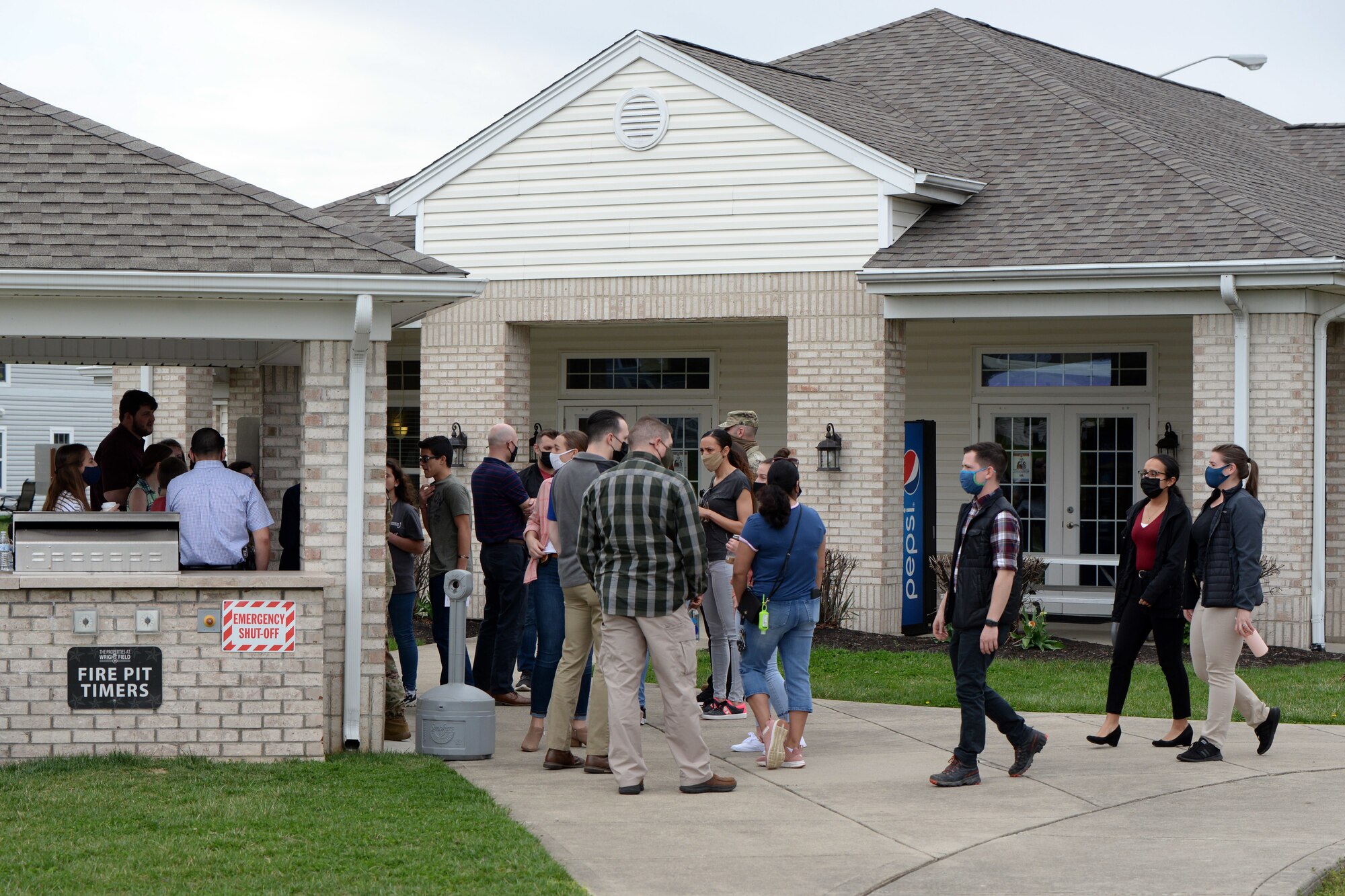 Residents and 88th Security Forces Squadron members attend the “Coffee with a Cop” outreach April 9 at Wright-Patterson Air Force Base. (U.S. Air Force photo by Ty Greenlees)