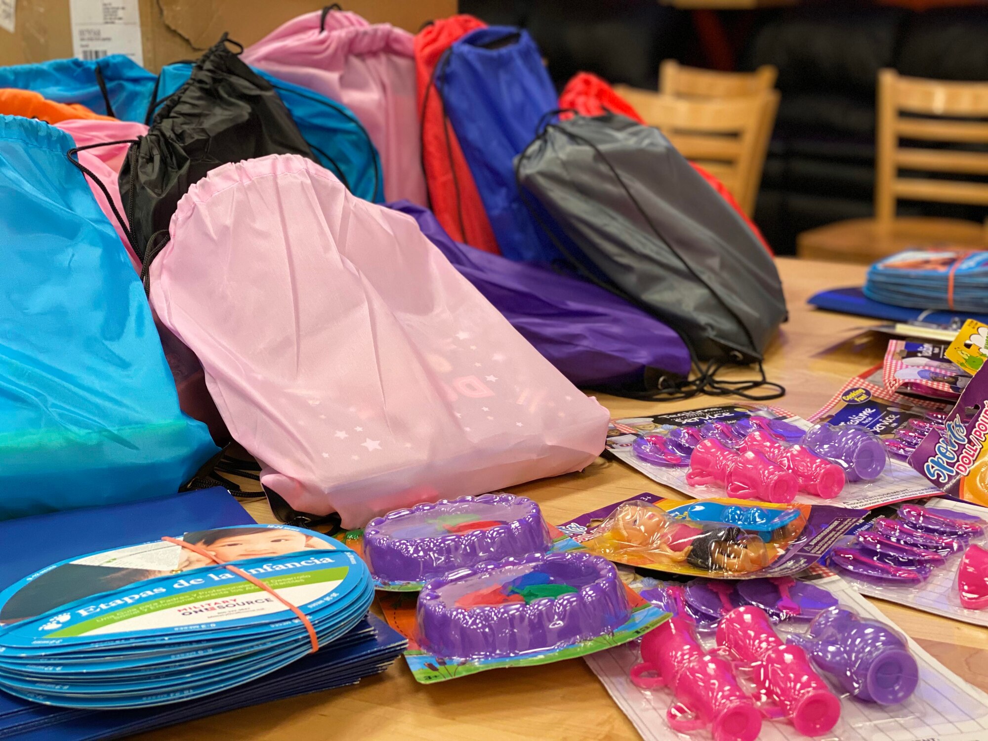 One hundred backpacks filled with school supplies, provided by 446th Airman and Family Readiness, were given to Reserve Citizen Airmen during a Baby Bundle + Kits for Kids event April 10 at Joint Base Lewis-McChord, Washington.
