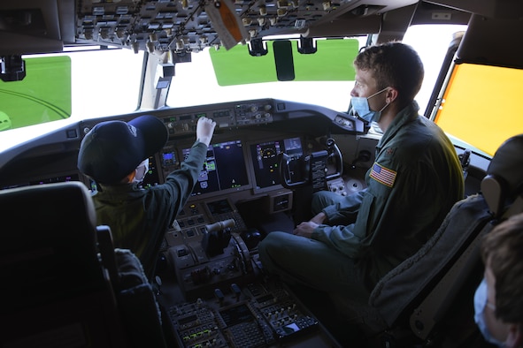 pilot explains controls to kid