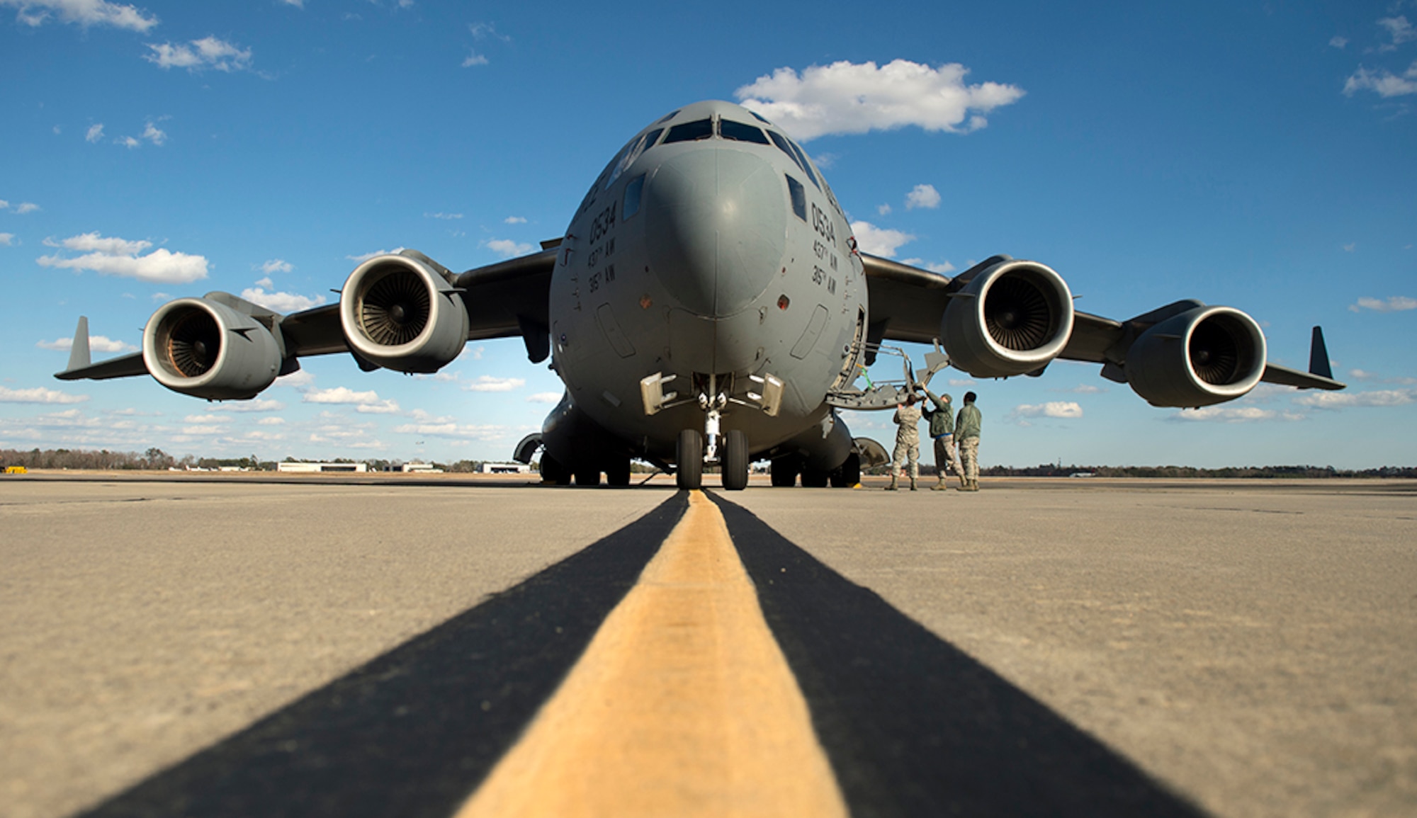 Non destructive inspection technicians assigned to the 437th Maintenance Squadron,  close the door of a C-17 Globemaster III after completing an inspection request on Feb. 18, 2015 at Joint Base Charleston, S.C. The 437th MXS NDI technicians are responsible for detecting cracks in aircraft or vehicle parts for the entire fleet at Joint Base Charleston. (U.S. Air Force photo by/Staff Sgt. Vernon Young Jr.)