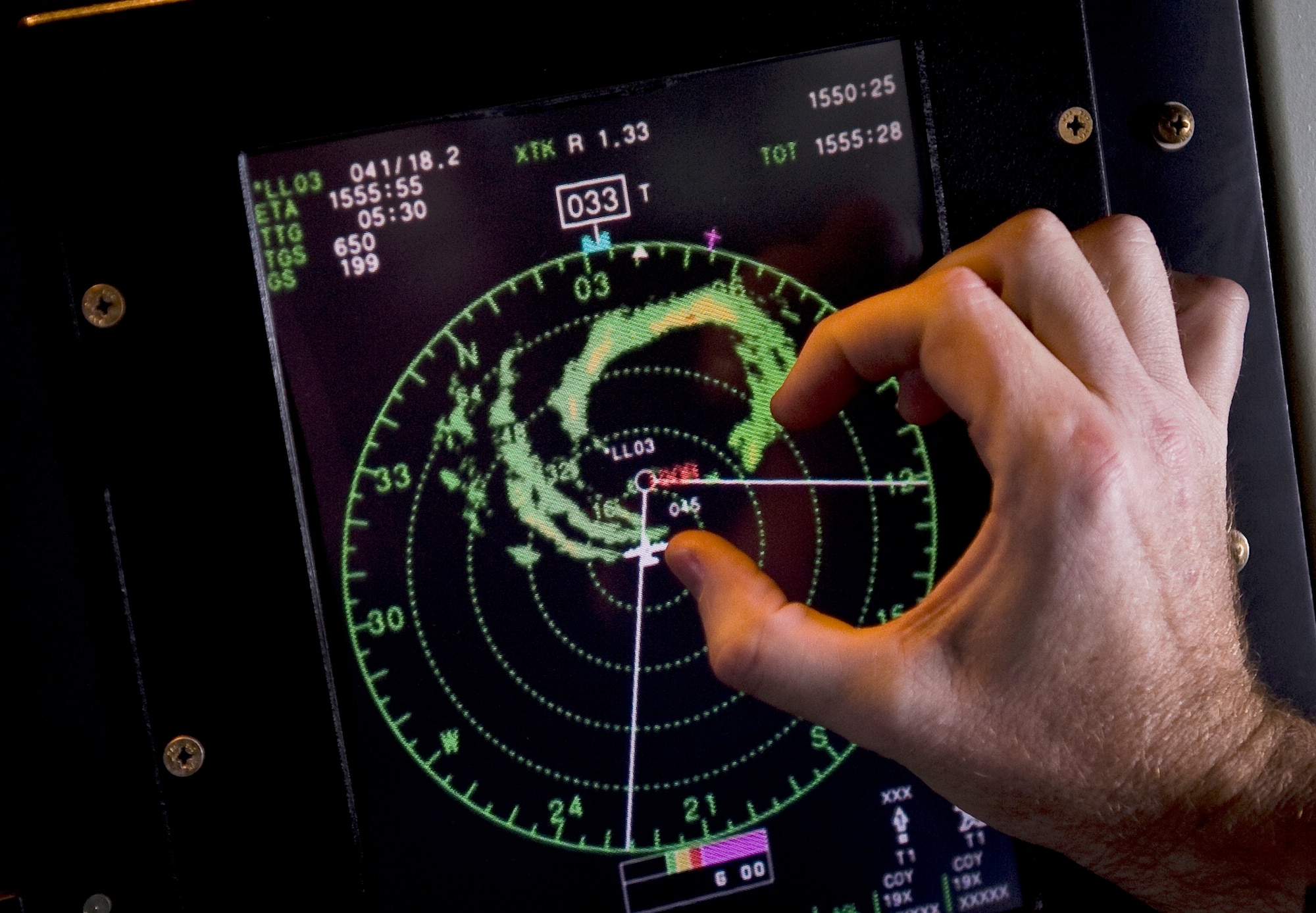 Lt. Col. John Gallagher roughly calculates the size of Hurricane Igor's eyewall onboard a WC-130J Hercules during a mission Sept. 16, 2010, over the Atlantic Ocean. Colonel Gallagher is a flight meteorologist with the Air Force Reserve Command‘s 53rd Weather Reconnaissance Squadron at Keesler Air Force Base. Miss.  (U.S. Air Force photo/Staff Sgt. Michael B. Keller)