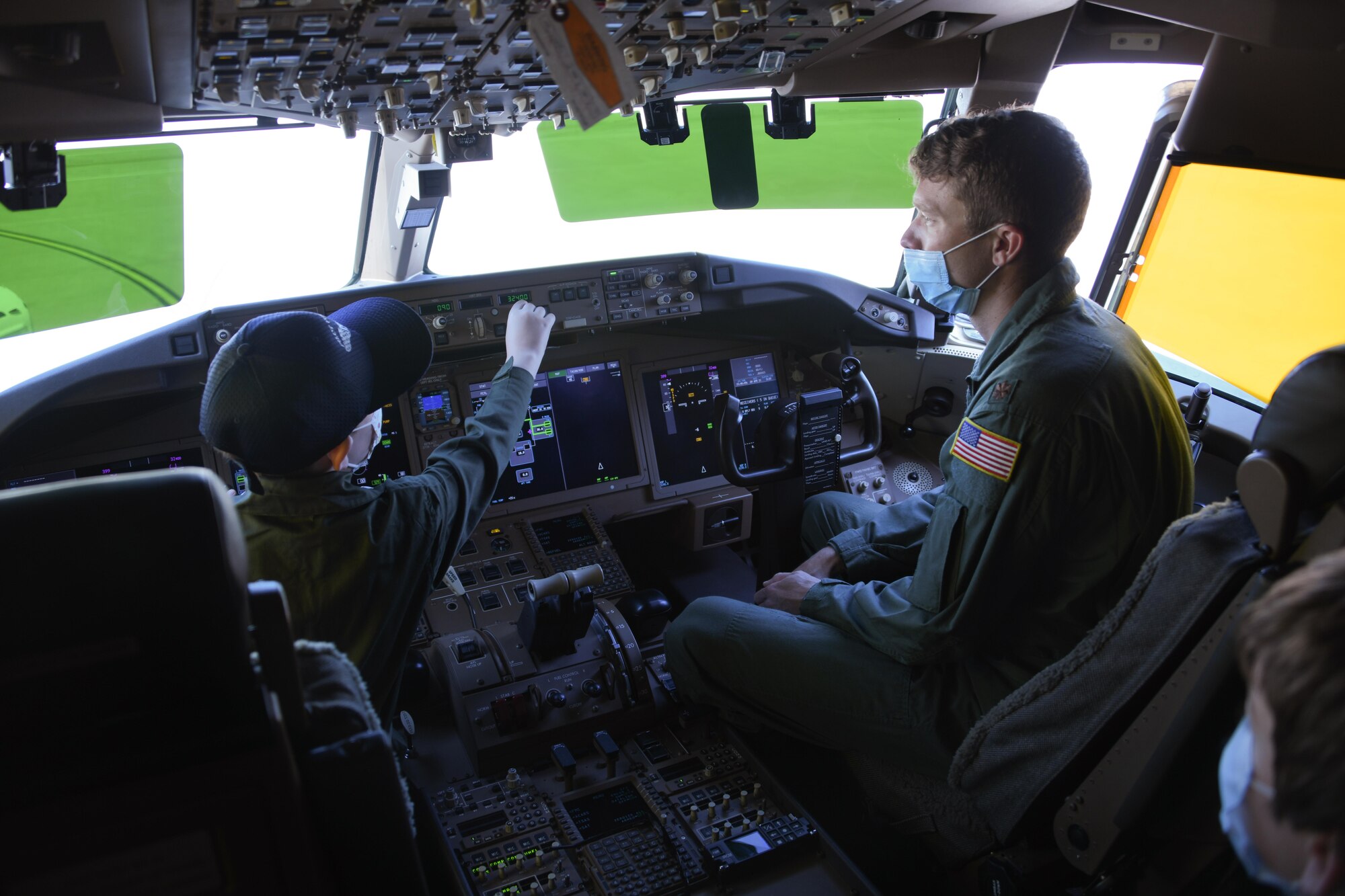 pilot explains controls to kid