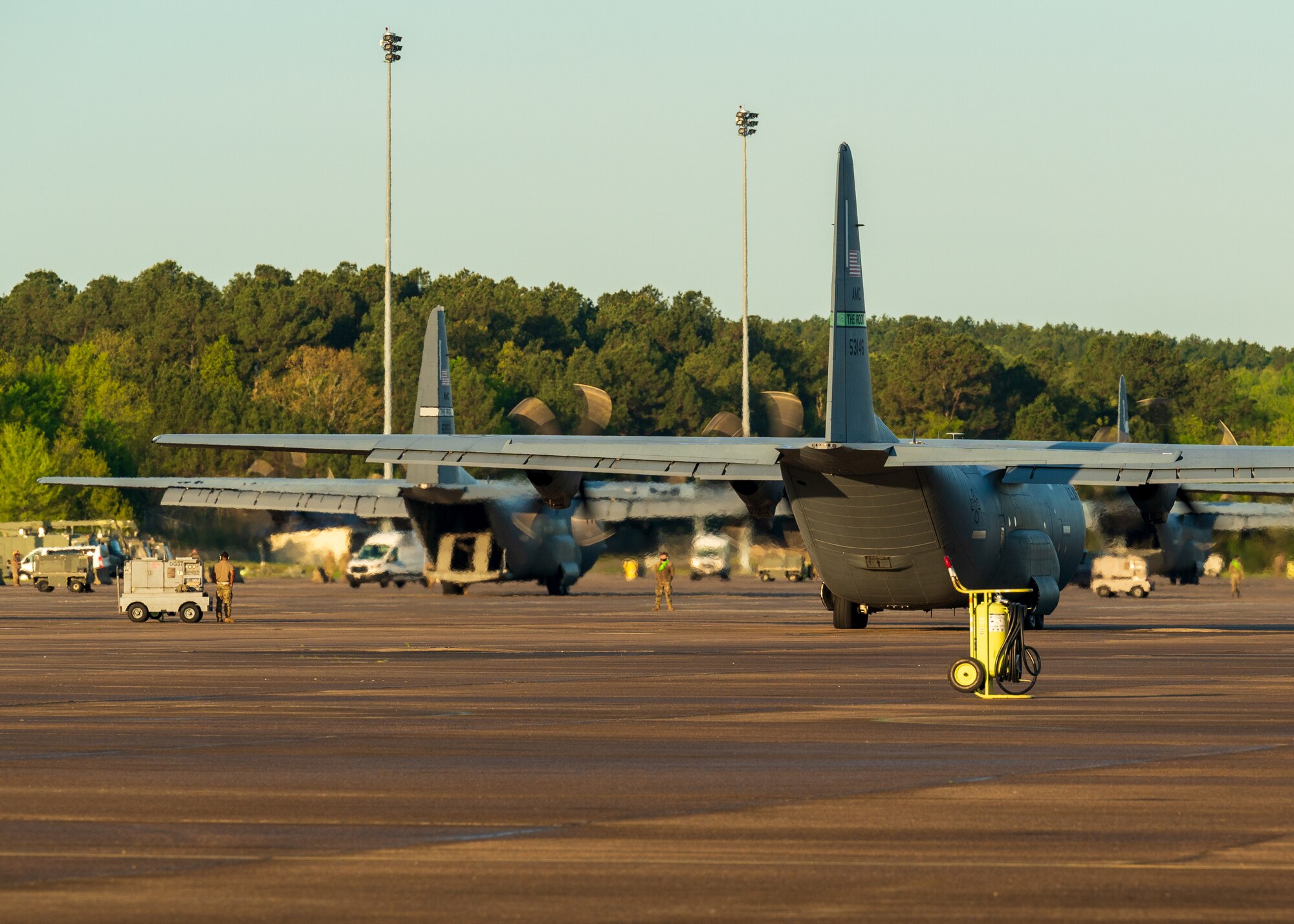 U.S. Air Force C-130J Super Hercules conduct an engine check on the flighline prior to joining an 11-ship formation from Little Rock Air Force Base, Ark., April 15. 2021. The elephant walk quickly launched combat airlift to support an U.S. Army Joint Readiness Training event. (U.S. Air Force photo by Maj. Ashley Walker)