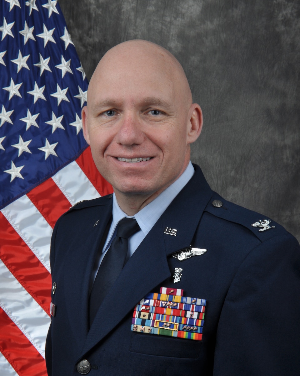 Col. Steven J. Theohares, 911th Aeromedical Staging Squadron commander, poses for his official portrait.