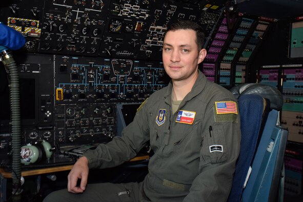 Master Sgt. Jason Henry, 733rd Training Squadron flight engineer instructor, sits in the cockpit of a C-5M Super Galaxy at Joint Base San Antonio-Lackland, Texas, March 25, 2021. Henry won senior NCO of the Year for 2020 at the 4th Air Force level, and went on to compete at Air Force Reserve Command. (U.S. Air Force photo by Senior Airman Brittany Wich)