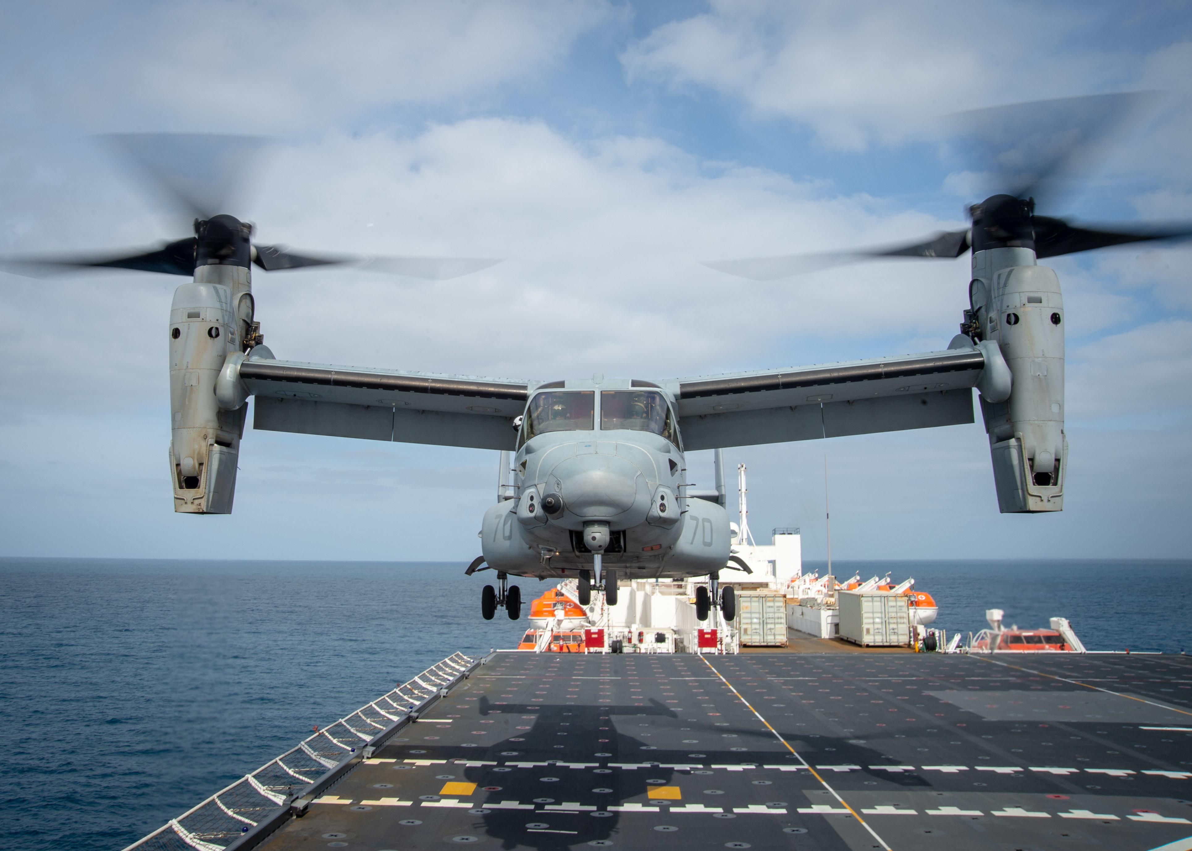 An MV-22B Osprey assigned to Air Test and Evaluation (HX) Squadron 21 of Naval Air Station (NAS) Patuxent River, Md., takes off from Military Sealift Command hospital ship USNS Mercy's (T-AH 19) flight deck.