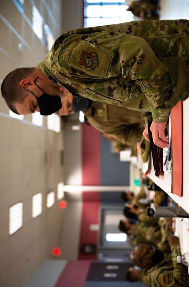 U.S. Airmen from the 354th Fighter Wing participate in a predeployment line during Arctic Gold 21-2 on Eielson Air Force Base, Alaska, April 8, 2021. The Stevens Joint Mobility Complex is the central hub for facilitating the deployment of several Airmen and cargoes since 2003. (U.S. Air Force photo by Airman 1st Class Jose Miguel T. Tamondong)