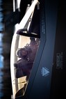 U.S. Air Force Maj. Brian Mueller, a 354th Fighter Wing (FW) F-35A Lightning II pilot, watches as his jet is hot pit refueled on the flightline at Eielson Air Force Base, Alaska, April 13, 2021. The 354th FW conducted a two-week readiness exercise to test their ability to rapidly deploy fifth generation fighters and personnel. (U.S. Air Force photo by Airman 1st Class Jose Miguel T. Tamondong)