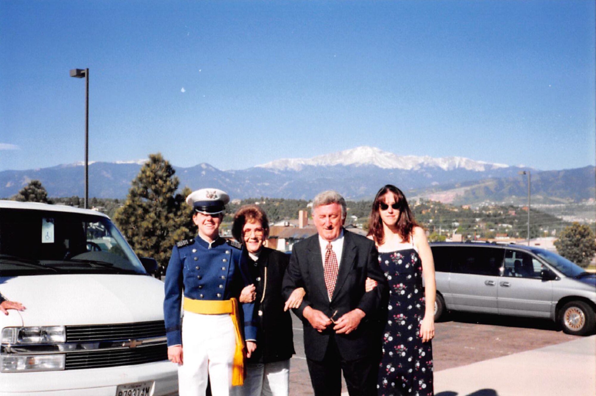 Family members gather following a cadet's graduation from the Air Force Academy.