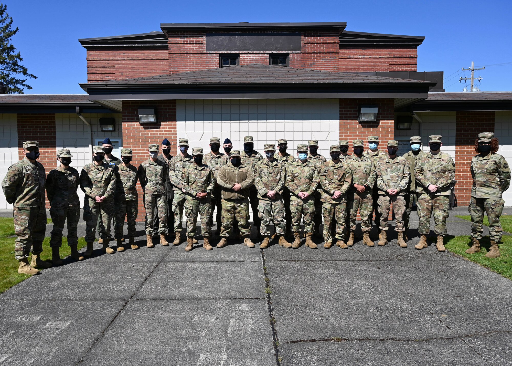 Participants in the first iteration of the Airmen Professional Enhancement Seminar pose for a group photo at Joint Base Lewis-McChord, Washington, April 13, 2021. This is the first group of junior enlisted Airmen to undergo the two-day training designed by the 5/6 Club and Top III. The PES is a two-day opportunity for junior enlisted Airmen to be mentored in the topics of habit forming, Air Force writing, enlisted performance report, emotional intelligence, retraining, diversity and inclusion, progressive discipline, enlisted force structure and more.  (U.S. Air Force photo by Airman 1st Class Callie Norton)