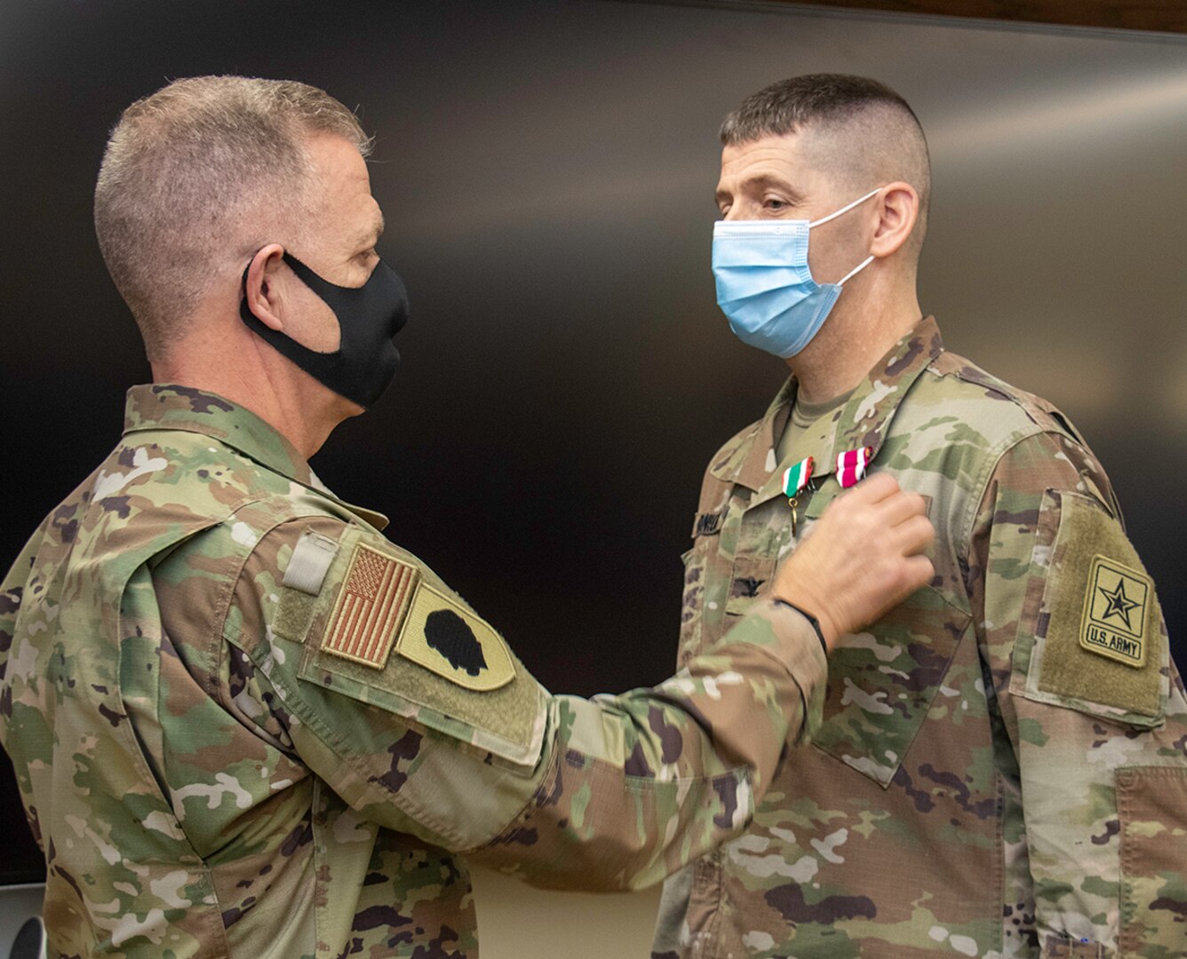 U.S. Army Col. Thomas Ransom (right) of Highland Park, Illinois, Illinois National Guard Inspector General (ILNG IG), receives a Meritorious Service Medal and the Illinois National Guard Military Medal of Merit, from Maj. Gen. Rich Neely, the Adjutant General of Illinois and Commander of the Illinois National Guard.