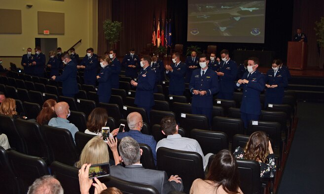 Retired U.S. Air Force Brig. Gen. John Allen, addresses the Specialized Undergraduate Pilot Training graduates of class 21-08 as the keynote speaker, Apr. 16, 2021, on Columbus Air Force Base, Miss. Allen has accumulated more than 6,000 flying hours during his 43 year aviation career, and shared his experiences with the newest aviators. (U.S. Air Force photo by Melissa Duncan-Doublin)