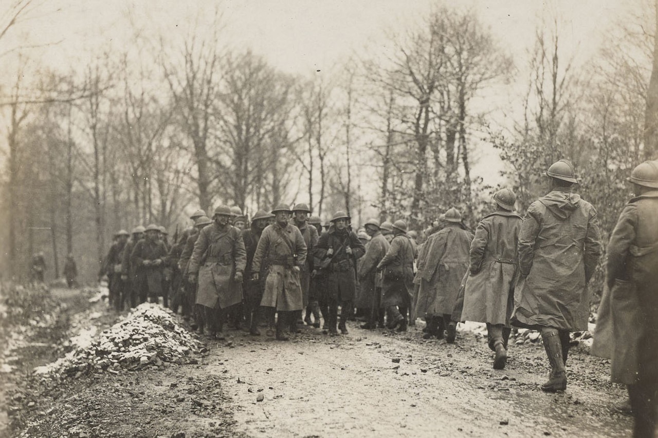 Soldiers march in formation.