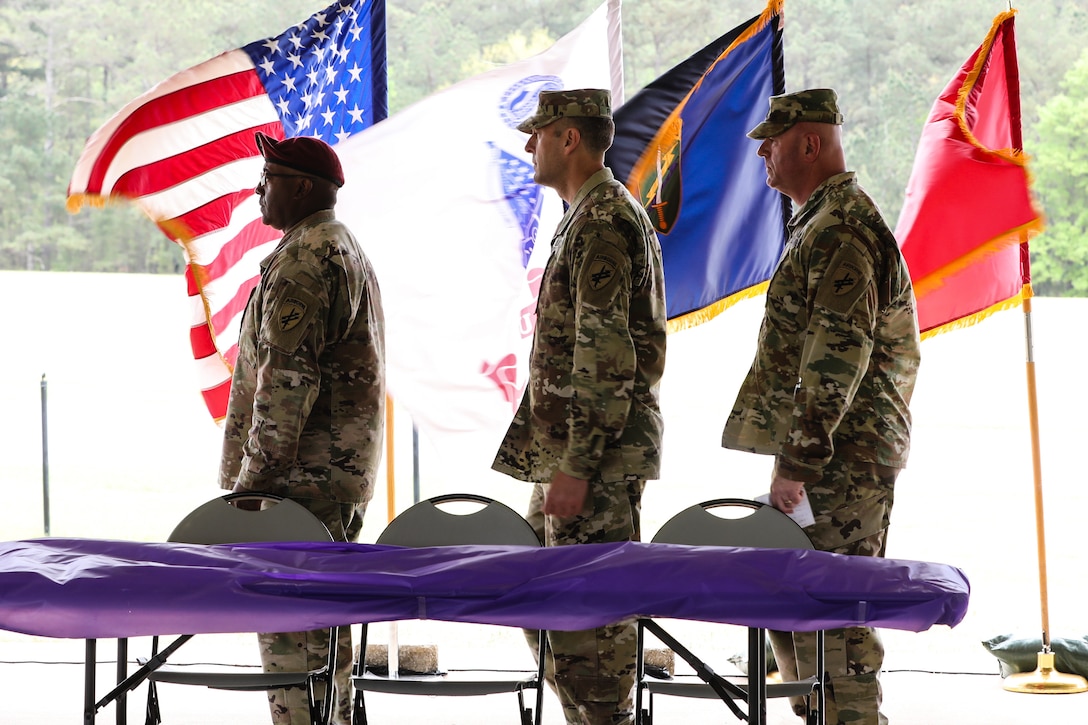 U.S. Army Reserve Command Sgt. Maj, Petter Trotter (left), the senior enlisted advisor for the U.S. Army Civil Affairs and Psychological Operations Command (Airborne), Brig. Gen. Jeffery Farris (center), commanding general of the 352nd Civil Affairs Command, and Command Sgt. Maj. Michael R. Mielke (right), senior enlisted advisor for the 352nd Civil Affairs Command, begin the award ceremony to finish the 2021 U.S. Army Civil Affairs and Psychological Operations Command (Airborne) Best Warrior Competition at Fort Jackson, S.C., April 10, 2021. The USACAPOC(A) BWC is an annual competition that brings in the best Soldiers across USACAPOC(A) to earn the title of “Best Warrior” among their peers after being evaluated on their individual ability to adapt and overcome challenging scenarios and battle-focused events, testing their technical and tactical abilities under stress and extreme fatigue.