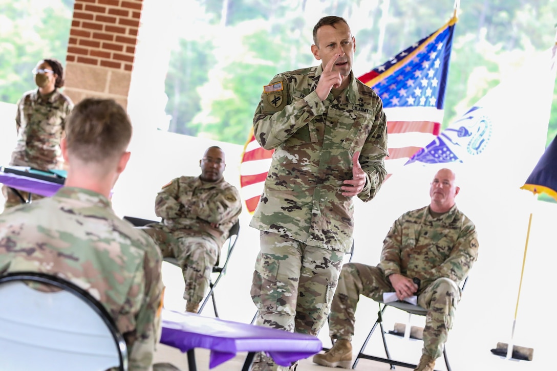 U.S. Army Reserve Brig. Gen. Jeffery Farris, right, the commanding general of the 352nd Civil Affairs Command, gives a speech during the award ceremony for the 2021 U.S. Army Civil Affairs and Psychological Operations Command (Airborne) Best Warrior Competition at Fort Jackson, S.C., April 10, 2021. The USACAPOC(A) BWC is an annual competition that brings in competitors from across USACAPOC(A) to earn the title of “Best Warrior.” BWC tests the Soldiers’ individual ability to adapt and overcome challenging scenarios and battle-focused events, testing their technical and tactical skills under stress and extreme fatigue.