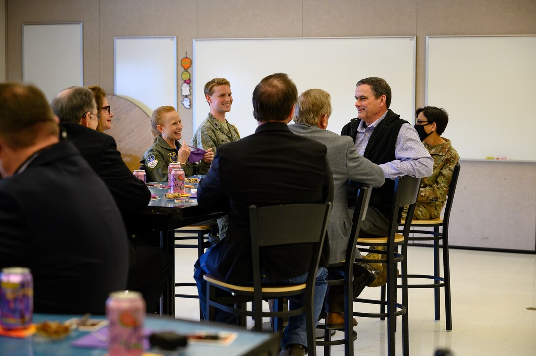 Distinguished visitors from Malmstrom Air Force Base and the Great Falls, Mont. education community speak to JROTC cadets during a facilities tour April 16, 2021, at Great Falls High School, Mont.