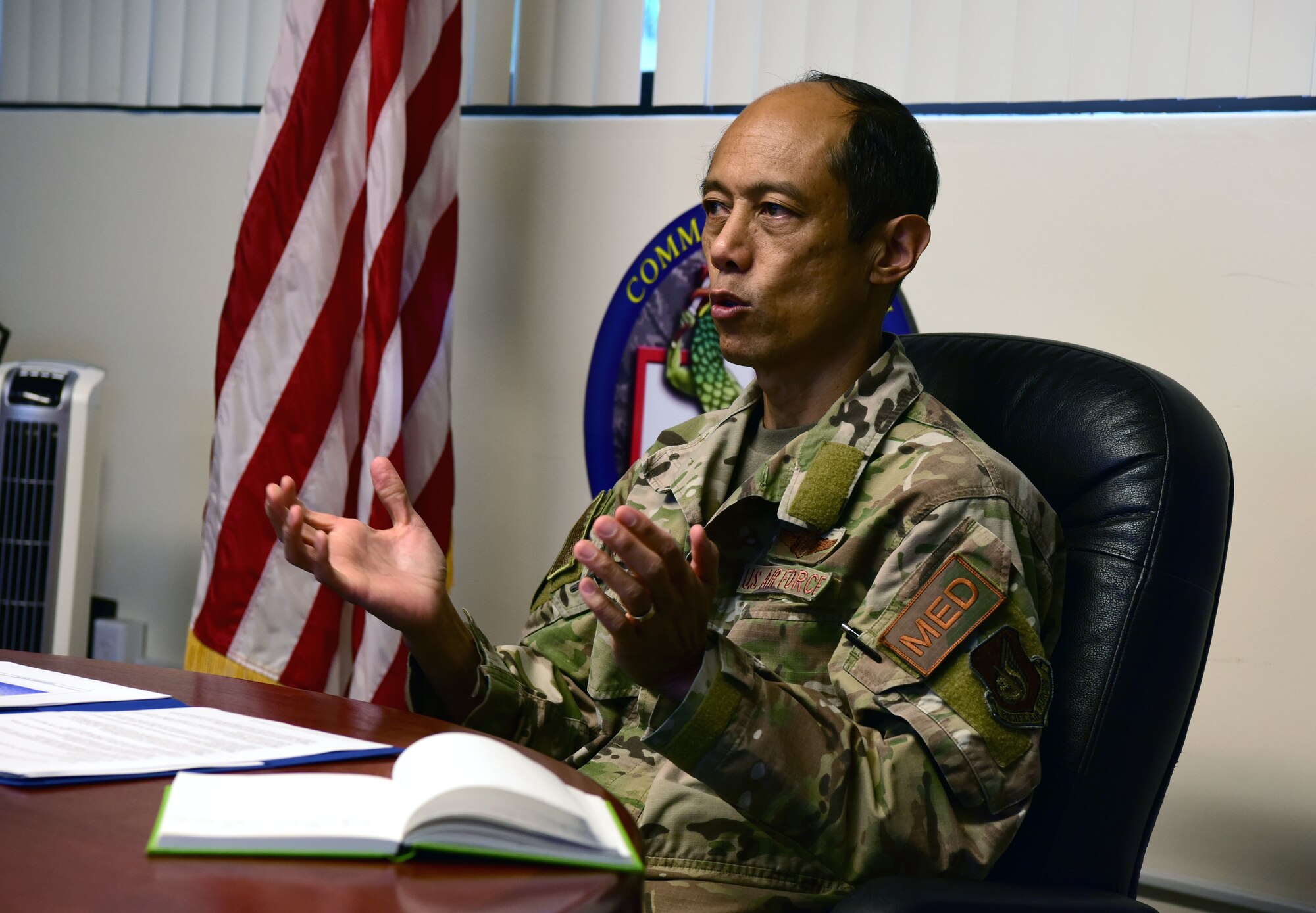 A photo of a U.S. Air Force officer speaking