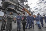 210415-N-WS494-1135 YOKOSUKA, Japan (April 15, 2021) Vice Adm. SAITO Akira, commander of Japan Maritime Self-Defense Force (JMSDF) Fleet Escort Force, and staff members, receive a tour of the flight deck from Capt. Fred Goldhammer, commanding officer, on the U.S. Navy’s only forward deployed aircraft carrier USS Ronald Reagan (CVN 76). Leadership from the 7th Fleet task forces that command Carrier Strike Group (CSG) 5 and Task Force 71 met with the commander of Japan Maritime Self-Defense Force (JMSDF) Fleet Escort Force aboard Ronald Reagan for a ship tour and staff discussions. Ronald Reagan, the flagship of CSG 5, provides a combat-ready force that protects and defends the United States, as well as the collective maritime interests of its allies and partners in the Indo-Pacific region.