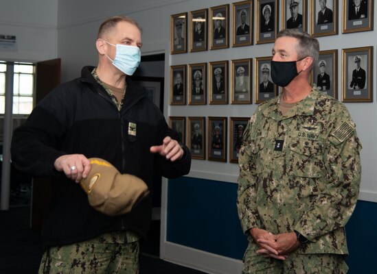 Newport, R.I. (April 13, 2021) Capt. Carey Cash, commanding officer, Naval Chaplaincy School and Center (NCSC), left, gives Rear Adm. Pete Garvin, commander, Naval Education and Training Command, a tour of NCSC during a visit to Naval Station (NAVSTA) Newport R.I., April 13. While onboard NAVSTA Newport, Garvin also visited Navy Supply Corps School, Center for Service Support, Surface Warfare Schools Command, and the Senior Enlisted Academy.  (U.S. Navy photo by Mass Communication Specialist 2nd Class Derien C. Luce)