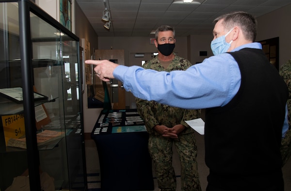 Newport, R.I. (April 13, 2021) Jim Jacobs, a Naval Supply Corps School (NSCS) instructor, gives Rear Adm. Pete Garvin, commander, Naval Education and Training Command, a tour of NSCS during a visit to Naval Station (NAVSTA) Newport R.I., April 13. While onboard NAVSTA Newport, Garvin also visited Center for Service Support, Naval Chaplaincy School and Center, Surface Warfare Schools Command, and the Senior Enlisted Academy.  (U.S. Navy photo by Mass Communication Specialist 2nd Class Derien C. Luce)