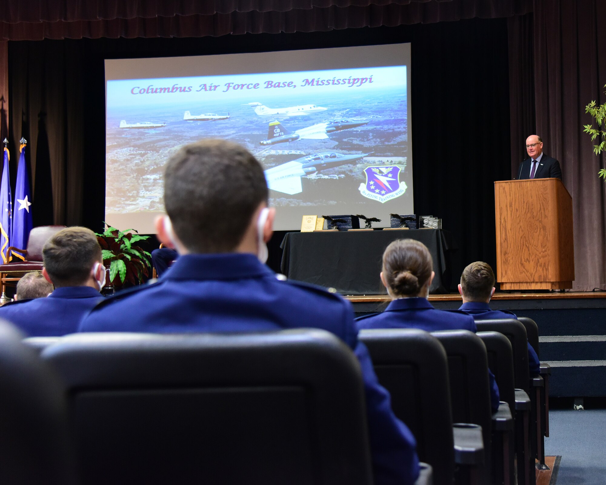 Retired U.S. Air Force Brig. Gen. John Allen, addresses the Specialized Undergraduate Pilot Training graduates of class 21-08 as the keynote speaker, Apr. 16, 2021, on Columbus Air Force Base, Miss. Allen has accumulated more than 6,000 flying hours during his 43 year aviation career, and shared his experiences with the newest aviators. (U.S. Air Force photo by Melissa Duncan-Doublin)
