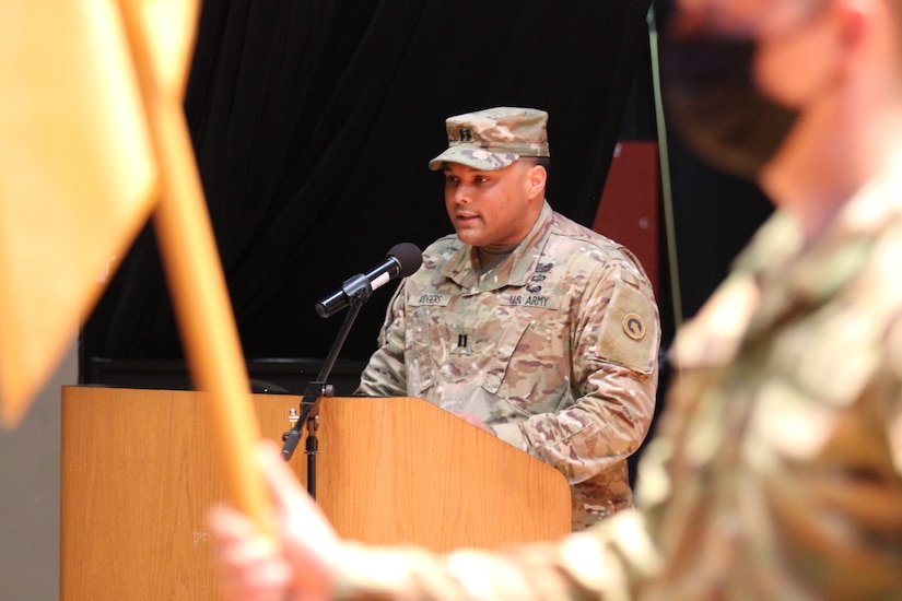 exiting commander speaks at podium