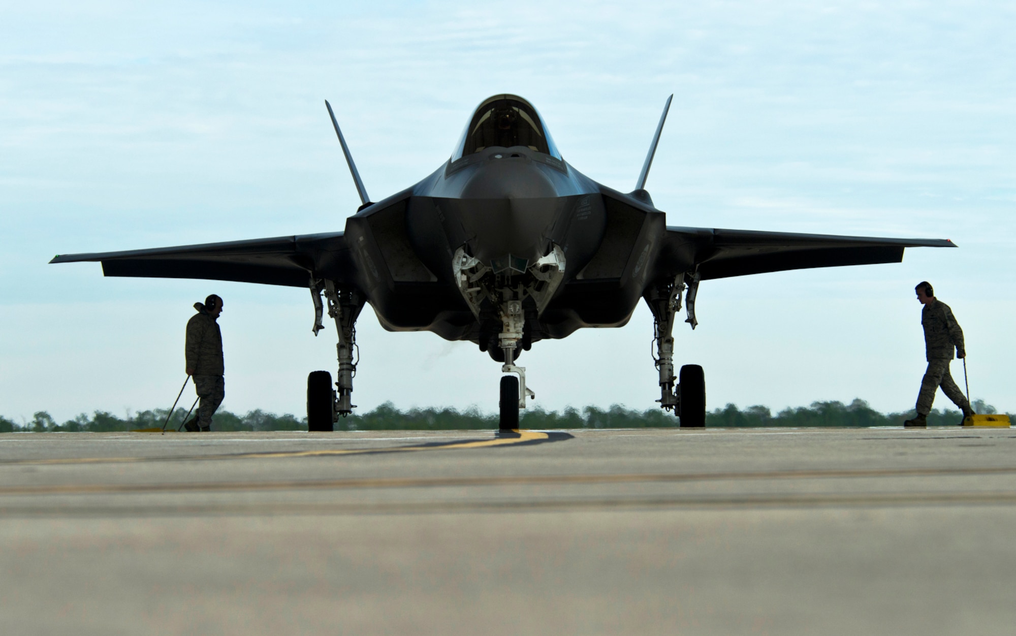 F-35A Lightning II joint strike fighter maintainers from the 58th Fighter Squadron at Eglin Air Force Base, Fla., prepare to park the jet after a local training mission over the Emerald Coast. (U.S. Air Force photo/Tech. Sgt. Bennie J. Davis III)