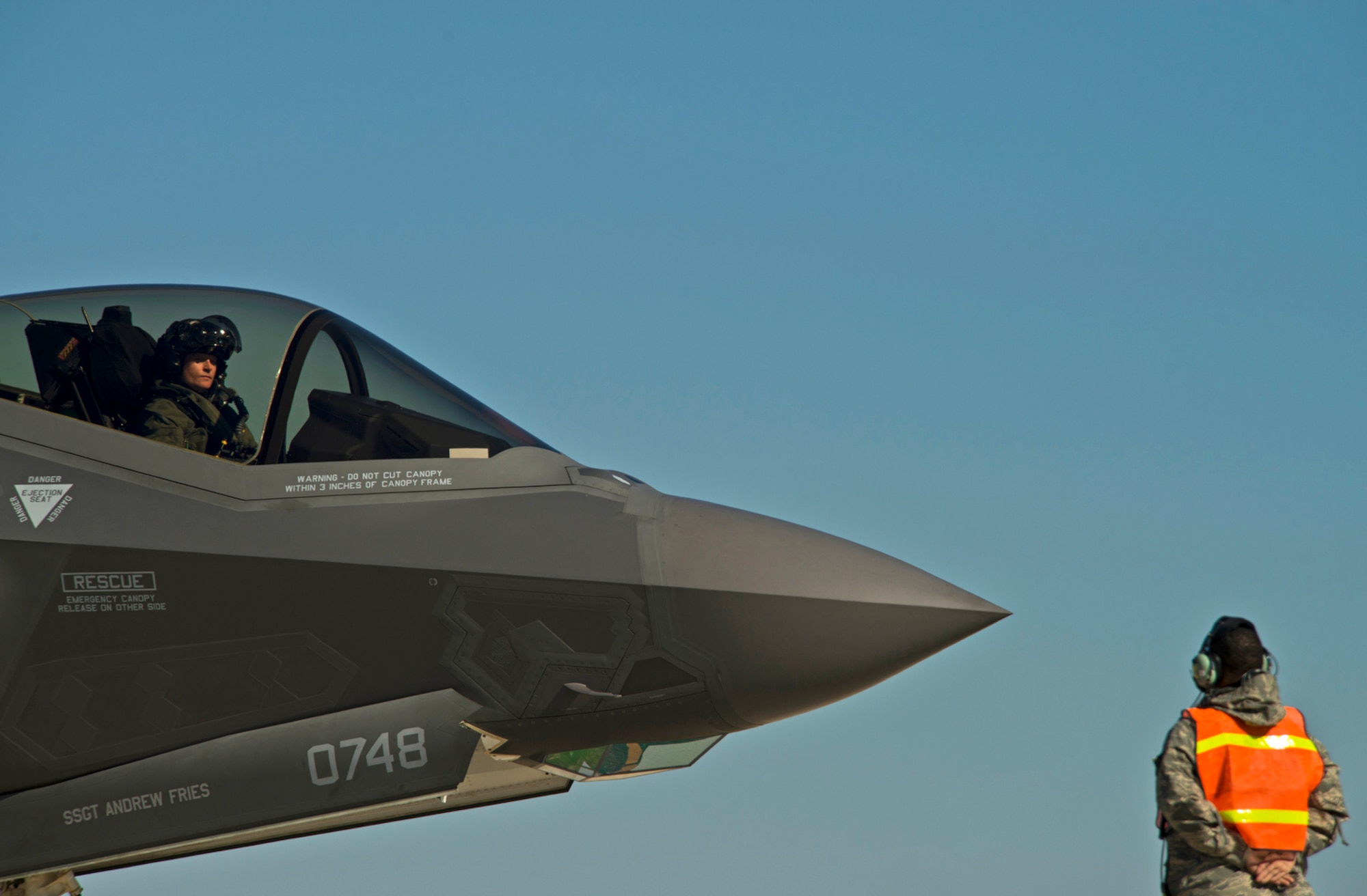 A F-35A Lightning II pilot of the 33d Fighter Wing, awaits taxing instructions after a hot-pit refueling, a procedure usually performed in a combat situation to rapidly refuel aircraft while their engines are running, resulting in a speedy refuel and getting pilots right back into the fight.(U.S. Air Force photo/Tech. Sgt. Bennie J. Davis III)