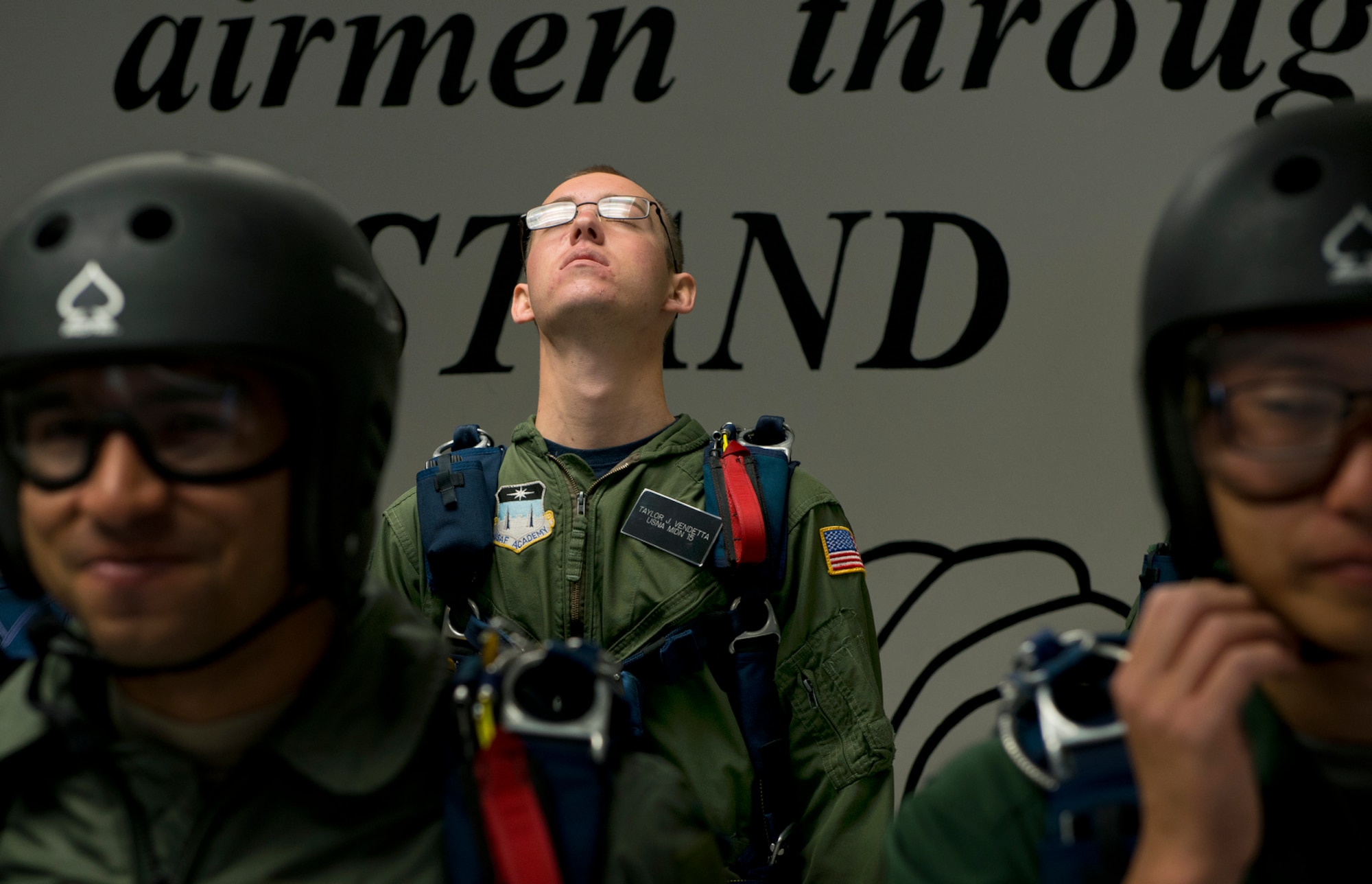 MidshipmanTaylor Vendetta, of the U.S. Navel Academy tries to relax before his first free-fall jump at the U.S. Air Force Academy's AM490 Basic Parachuting course. (U.S. Air Force photo/Tech. Sgt. Bennie J. Davis III)