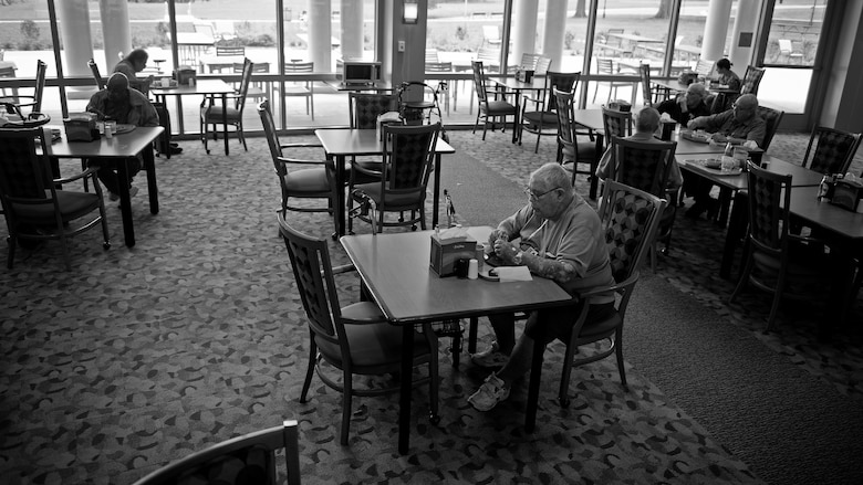 After Bill Castle finishes his morning activities at the Armed Forces Retirement Home, he goes to lunch, where he often eats alone. (U.S. Air Force photo/Staff Sgt. Andrew Lee)