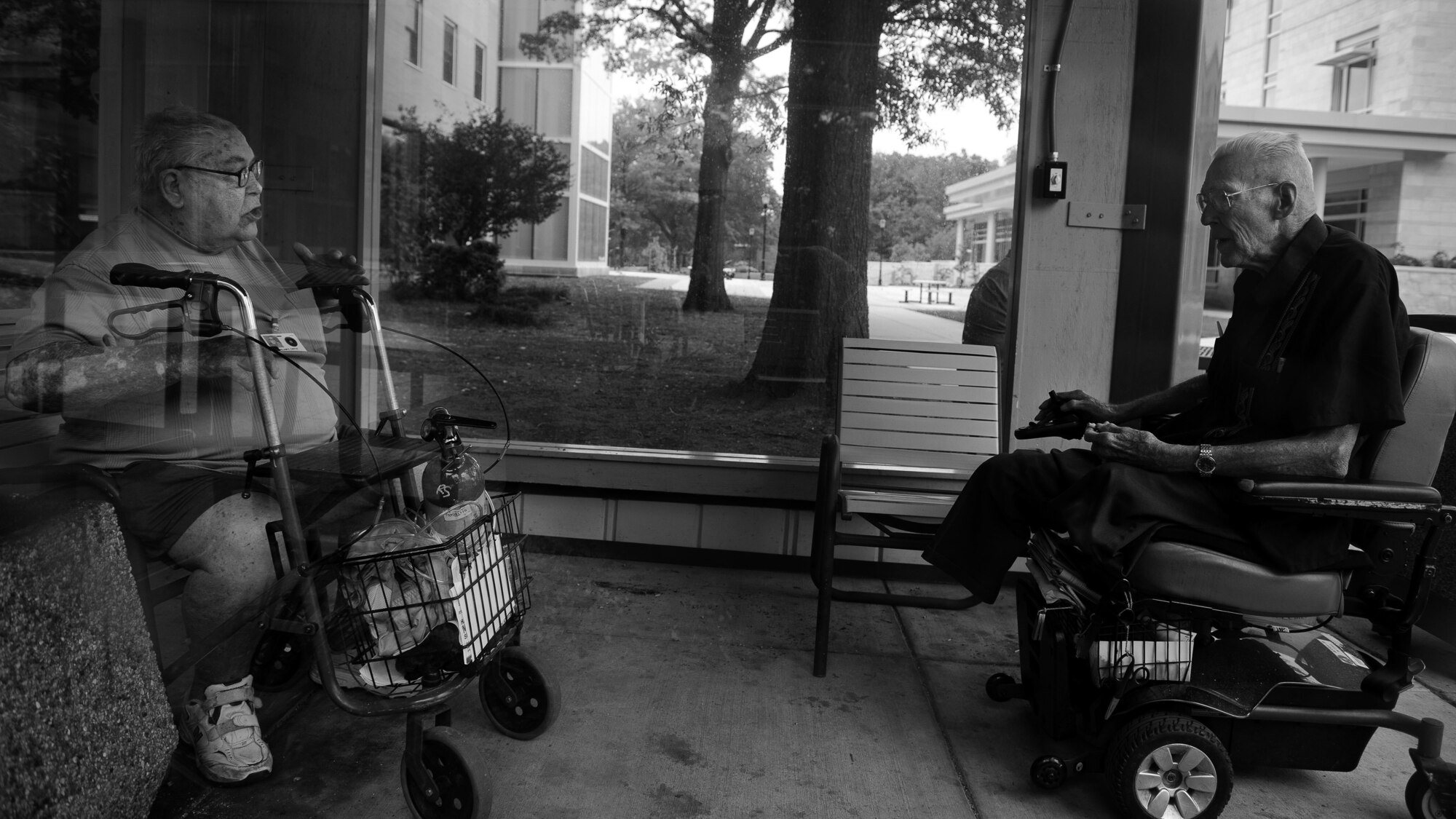 Bill Castle spends a few hours each day talking with his friends in the smoke pit in front of the Armed Forces Retirement Home in Washington, D.C.  (U.S. Air Force photo/Staff Sgt. Andrew Lee)