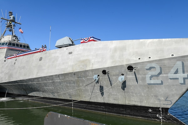 USS Oakland (LCS 24) moored pierside during the commissioning ceremony.