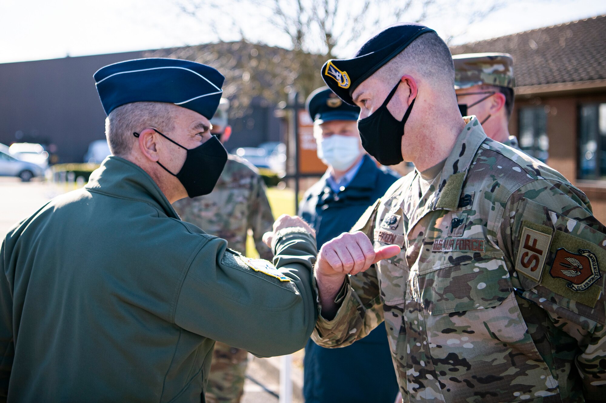 SMSgt Jeremy Burkeen, right, 423rd Security Forces Squadron operations superintendent, greets Gen. Jeff Harrigian, left, U.S. Air Forces in Europe and Air Forces Africa commander at RAF Alconbury, England, April 15, 2021. Harrigian visited the 501st Combat Support Wing to speak with and recognize Airmen from multiple squadrons across the wing. (U.S. Air Force photo by Senior Airman Eugene Oliver)