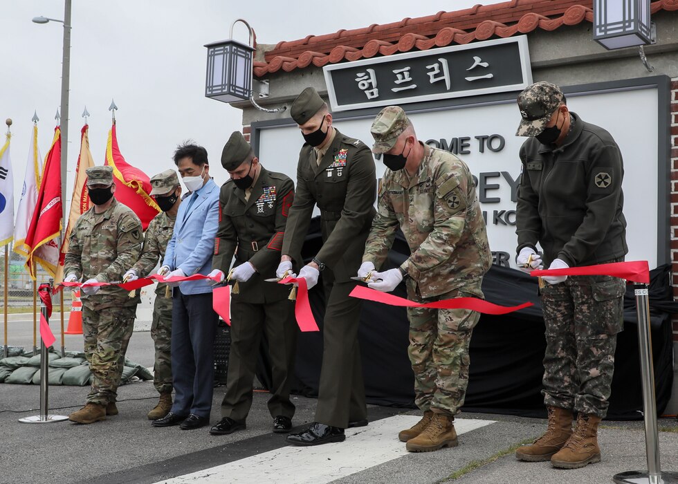 U.S. Marine Corps, U.S. Army, and Republic of Korea personnel cut the ribbon and unveiled the gate during a dedication ceremony in honor of U.S. Marine Corps Brig. Gen. Robert E. Galer, a combat aviator and holder of the Nation’s highest decoration, the Medal of Honor, on Camp Humphreys, Pyeongtaek-Si, Republic of Korea, April 16, 2021.