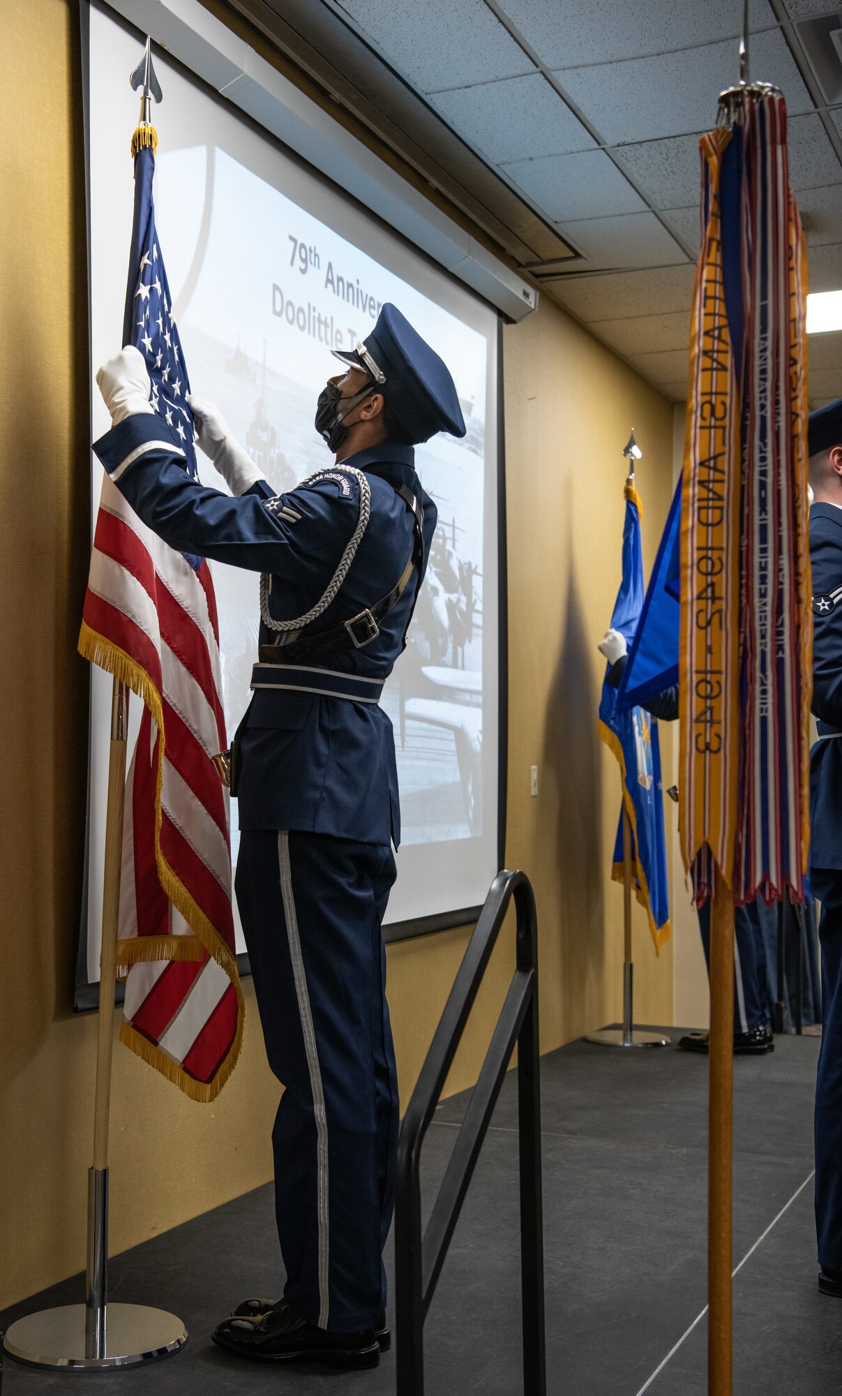 A 28th Bomb Wing Honor Guard member posts the U.S. flag during the 79th Doolittle Raid anniversary ceremony on Ellsworth Air Force Base, S.D., April 16, 2021. The Doolittle Raid took place on April 18, 1942, after Japanese forces launched a surprise bombing on Pearl Harbor. 
(U.S. Air Force photo by Airman Jonah Fronk)