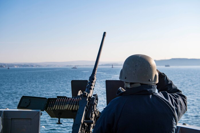 210417-N-NQ285-1097
PLYMOUTH, England (April 17, 2021) Fire Controlman 2nd Class Preston Short, assigned to the Harpers Ferry-class dock landing ship USS Carter Hall (LSD 50), mans an M2 .50-caliber machine gun during a sea and anchor evolution, April 17, 2021. Carter Hall is operating in the Atlantic Ocean with Amphibious Squadron 4 and the 24th Marine Expeditionary Unit (24th MEU) as part of the Iwo Jima Amphibious Ready Group. (U.S. Navy photo by Mass Communication Specialist Seaman Sawyer Connally)