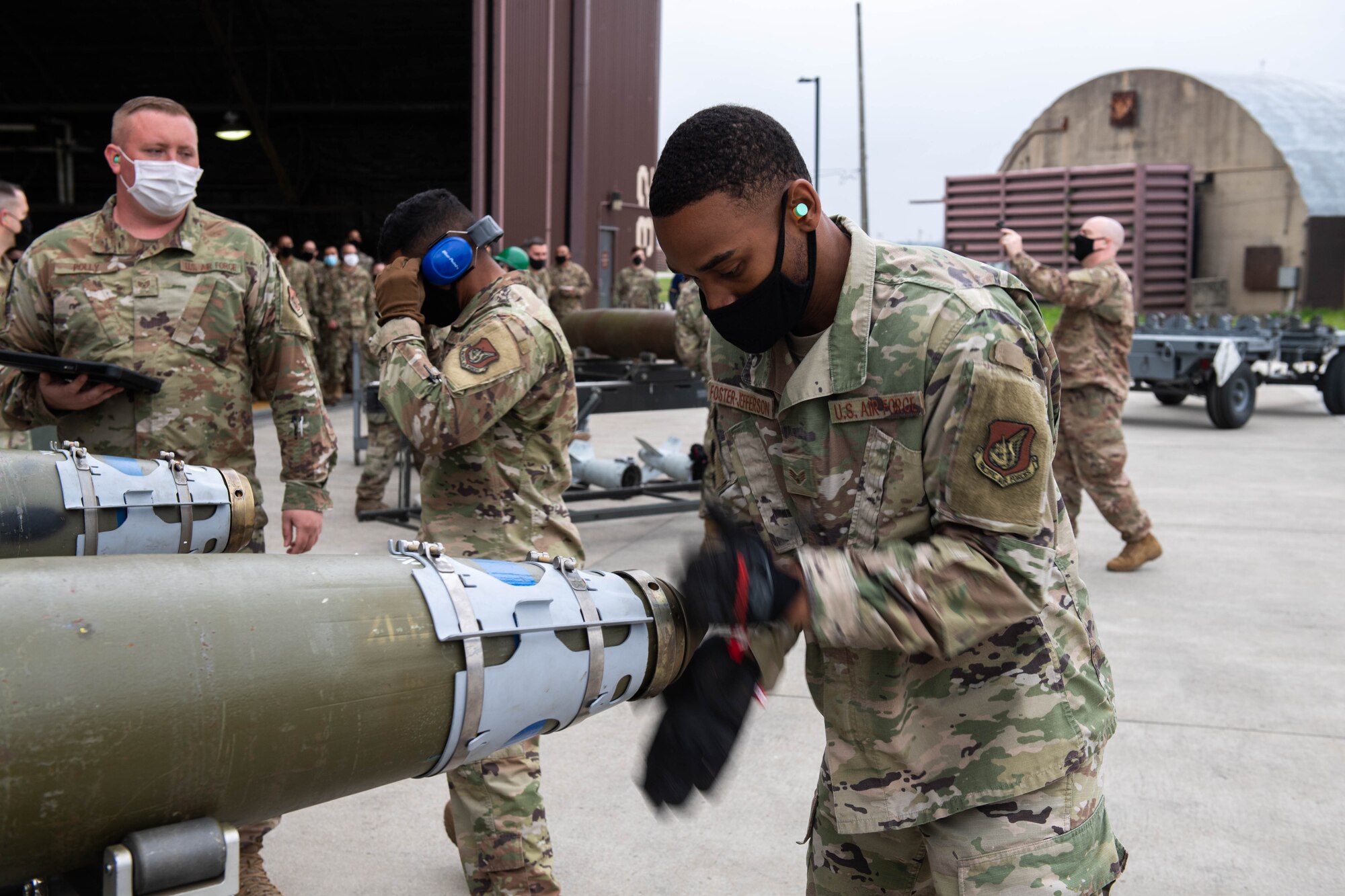 Senior Airman Khalil Foster-Jefferson, 51st Munitions Squadron, competes in the Load Crew of the Quarter Competition at Osan Air Base, Republic of Korea, April 16, 2021. Two teams raced to build and load munitions onto both the A-10 Thunderbolt II and an F-16 Fighting Falcon aircraft. (U.S. Air Force photo by Senior Airman Kevyn Allen)