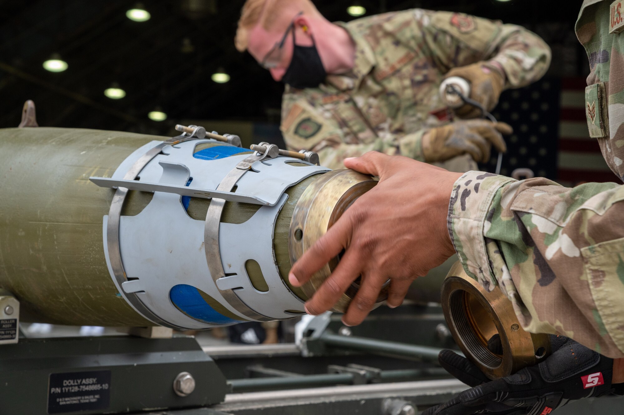 Senior Airman Khalil Foster-Jefferson, 51st Munitions Squadron, competes in the Load Crew of the Quarter Competition at Osan Air Base, Republic of Korea, April 16, 2021. Two teams raced to build and load munitions onto both the A-10 Thunderbolt II and F-16 Fighting Falcon aircraft. (U.S. Air Force photo by Technical Sgt. Nicholas Alder)
