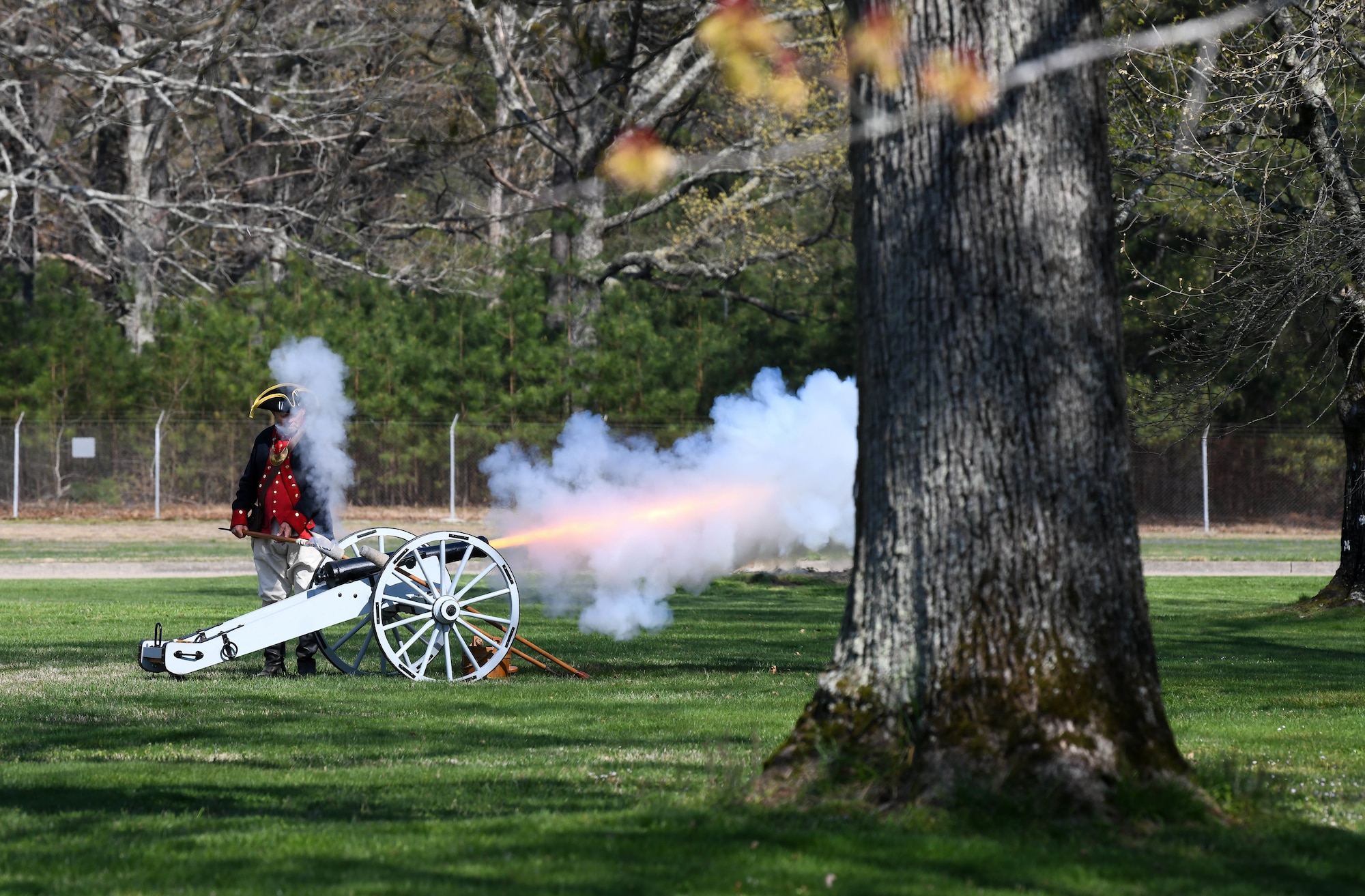 Steve Gaines, president of the Tennessee Society of the Sons of the American Revolution, fires a cannon during a flag retreat ceremony held to mark the end of Extremism Stand Down exercises, April 6, 2021, at Arnold Air Force Base, Tenn. Gaines spoke about the history of the U.S. Constitution during the proceedings. (U.S. Air Force photo by Jill Pickett)