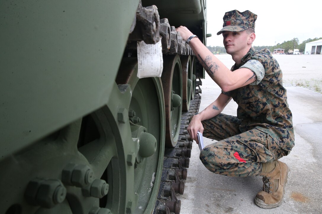 Lance Cpl. Jacob B. Pickett, a landing support specialist with 2nd Transportation Battalion, 2nd Marine Logistics Group, poses for a photo on Camp Lejeune, North Carolina, April 1, 2020. “Knowledge is power that can and will put you in a position to do great thing,” said Pickett, a Rockmart, Georgia native. According to his leadership, Pickett is currently one of few lance corporals in the platoon who participates as a Team Leader during Helicopter Support Operations, as well as a Safety NCO underneath the aircraft. Pickett was distinguished as being an excellent representation of his command by the participating squadron Marine Medium Tilt-Rotor Squadron (VMM) 162. His professionalism and coordination throughout the operation successfully led to over ten day time and night time lifts being conducted at Tactical Landing Zone Phoenix with zero mishaps and injuries.. (U.S. Marine Corps photo by Cpl Seaira Moore)
