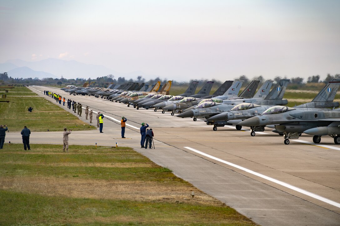 Aircraft from several countries participating in INIOCHOS 21 line up prior to an elephant walk at Andravida Air Base, Greece, April 18, 2021. Elephant walks are a show of force, demonstrating the might and power of the U.S. Air Force and its allies. The 510th Fighter Squadron participated in INIOCHOS 21, a Hellenic air force-led exercise designed to enhance the interoperability and skills of allied and partner air forces in the accomplishment of joint operations and air defenses. (U.S. Air Force photo by Airman 1st Class Thomas S. Keisler IV)