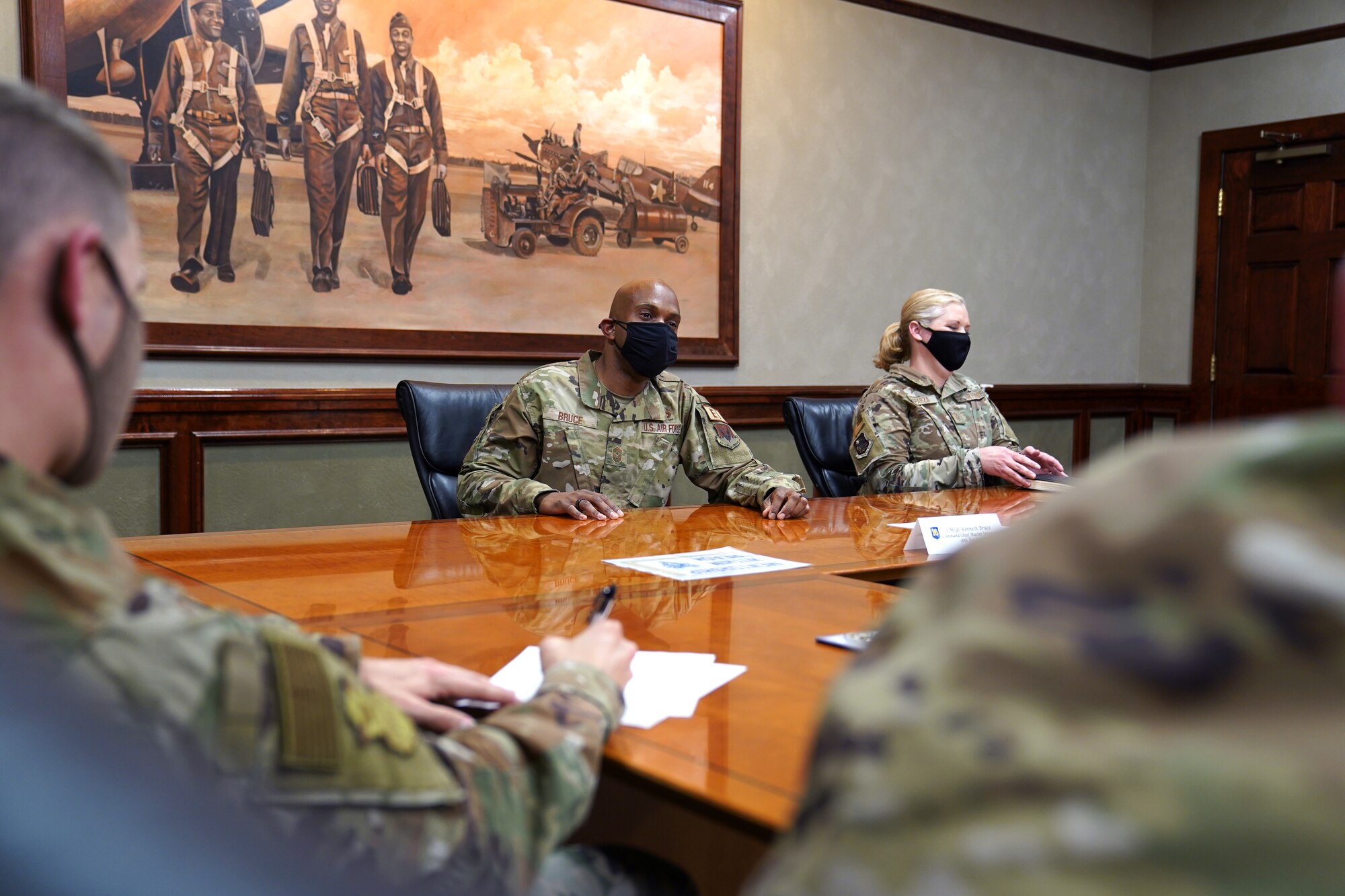 U.S. Air Force Chief Master Sgt. Kenneth Bruce Jr., 16th Air Force command chief, hosts a meeting with Keesler Personnel inside Stennis Hall at Keesler Air Force Base, Mississippi, March 25, 2021. During the meeting, Bruce spoke about mentorship and his experience in the Air Force. (U.S. Air Force photo by Senior Airman Seth Haddix)