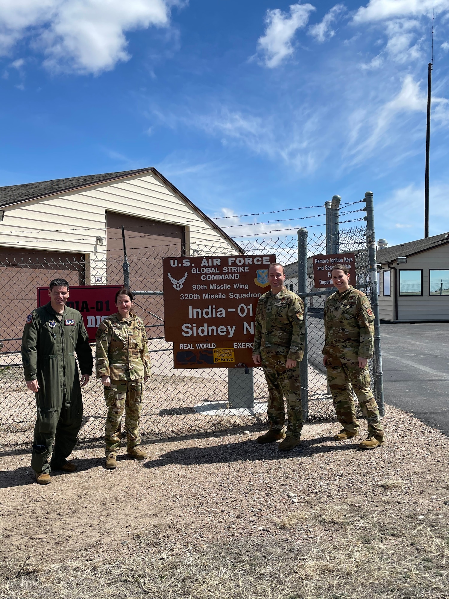 commanders pose for photo outside I-01