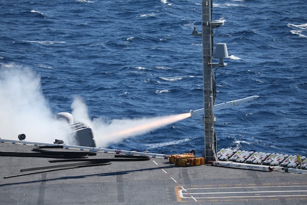 An evolved sea sparrow missile (ESSM) launches from one of the weapons sponsons aboard the aircraft carrier USS Gerald R. Ford (CVN 78) during combat systems ship qualification trials (CSSQT).