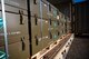 A pile of munitions bomb component containers are prepared  for inspection during a munitions barge at Eielson Air Force Base, Alaska, April 16, 2021.