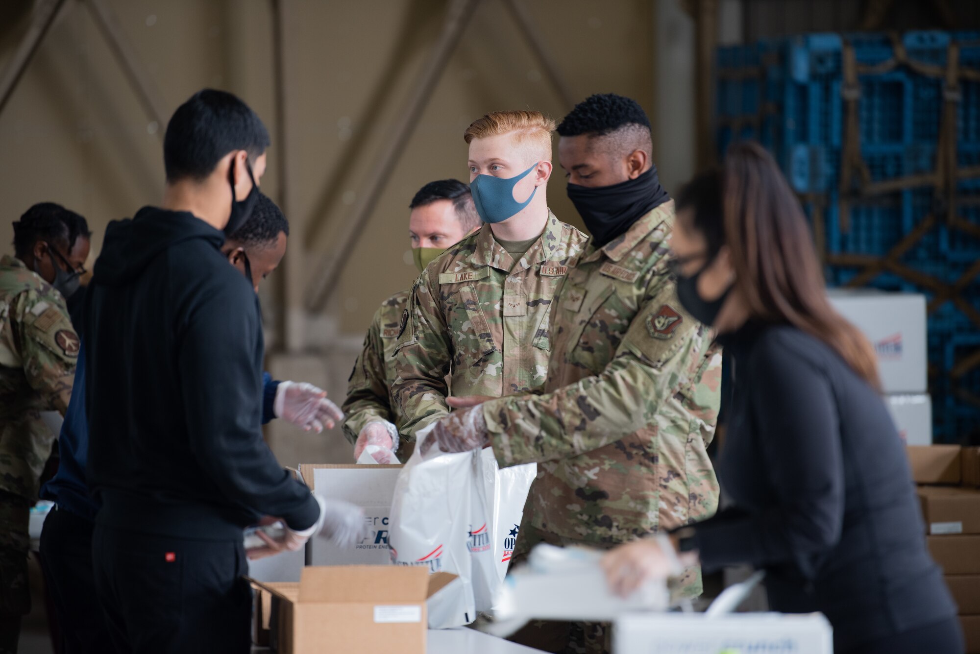 Airman and Volunteers Build Care Kits