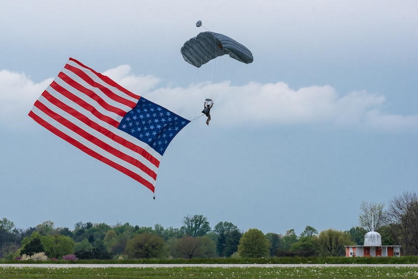 A member of the Kentucky Air National Guard’s 123rd Special Tactics Squadron executes a high-altitude, low-opening parachute jump into Bowman Field in Louisville, Ky., April 17, 2021 to open the Thunder Over Louisville air show. The annual event featured more than 20 military and civilian aircraft. (U.S. Air National Guard photo by Dale Greer)