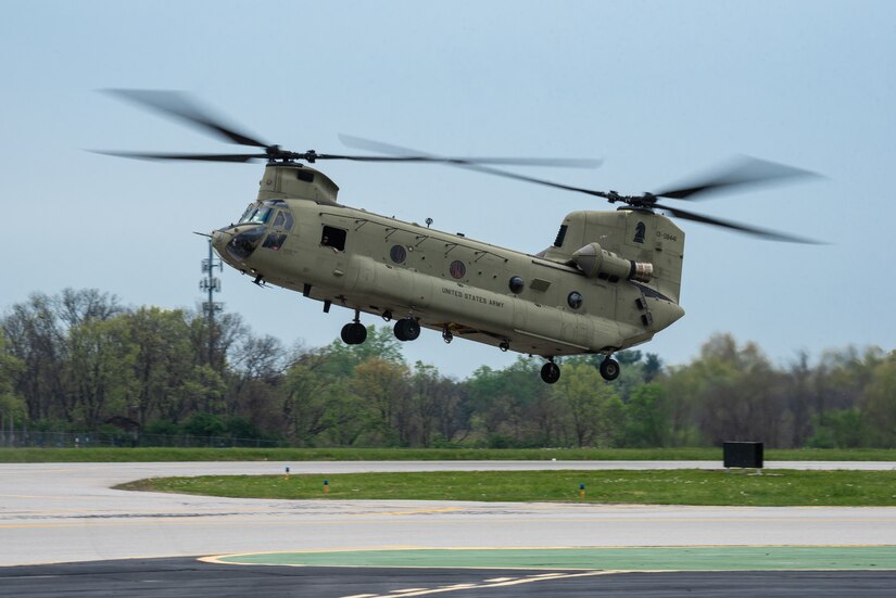 A U.S. Army CH-47 Chinook helicopter performs an aerial demonstration over Bowman Field in Louisville, Ky., April 17, 2021, as part of the Thunder Over Louisville air show. The annual event featured more than 20 military and civilian air craft this year. (U.S. Air National Guard photo by Dale Greer)