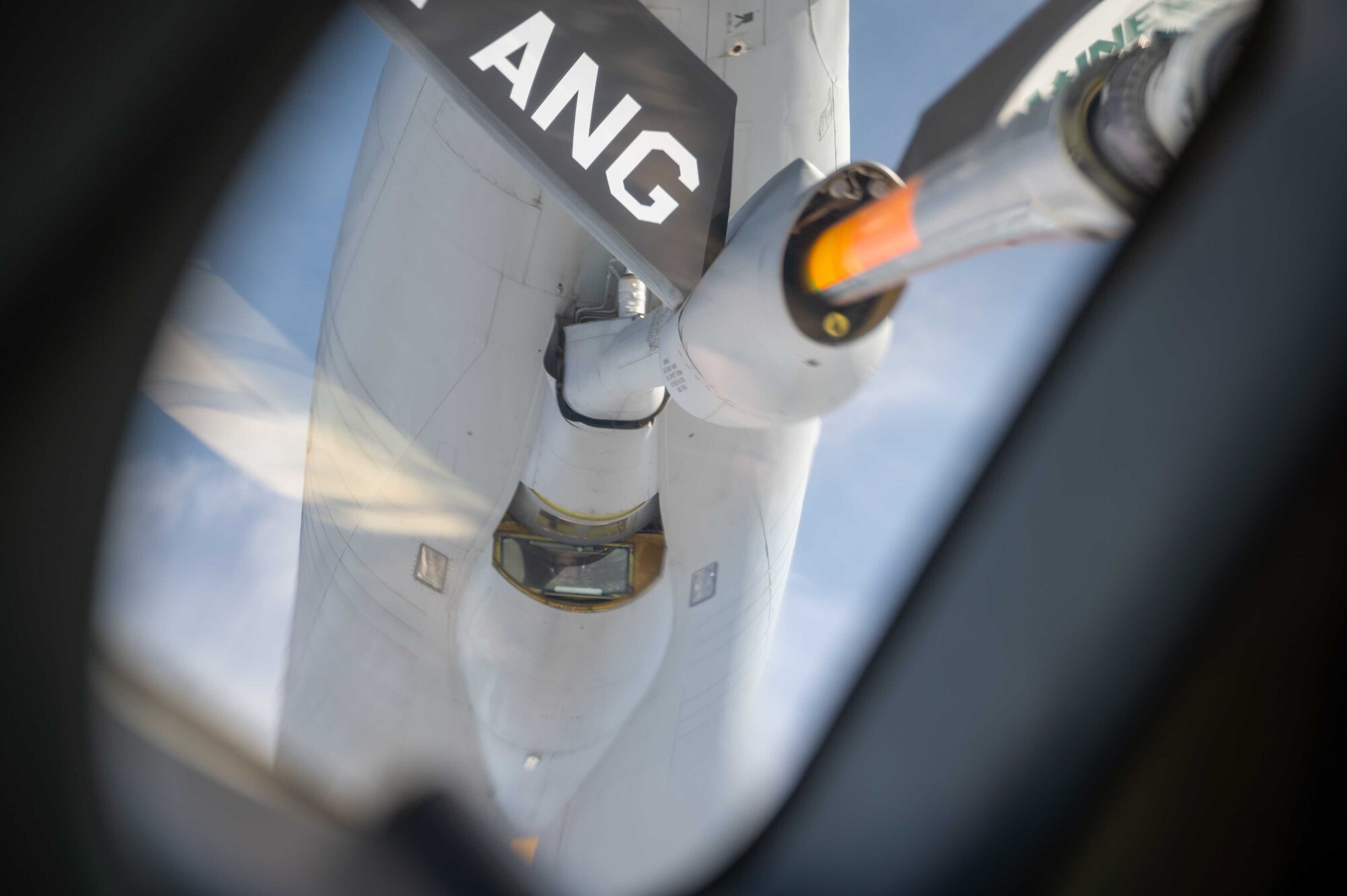 A KC-135 Stratotanker assigned to the 101st Air Refueling Wing, Maine Air National Guard, refuels a Dover Air Force Base C-17 Globemaster III over Maine, March 16, 2021. The 3rd AS constantly trains to provide global reach with unique, outsized and oversized airlift capability. (U.S. Air Force photo by Airman 1st Class Faith Schaefer)